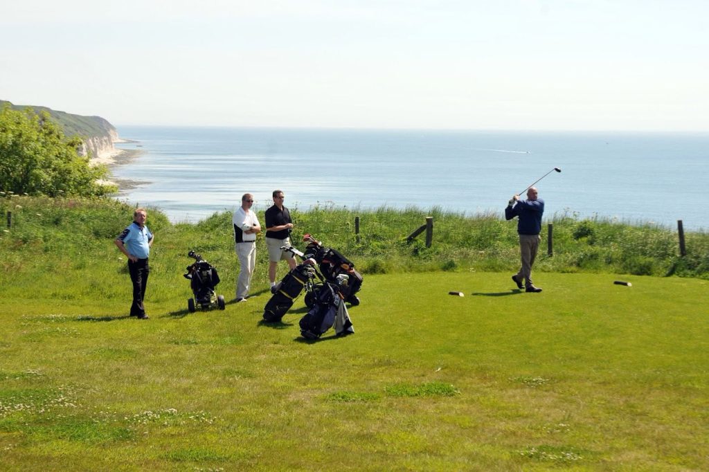 A golf buggy beside the fairway on the links course at Bridlington Links