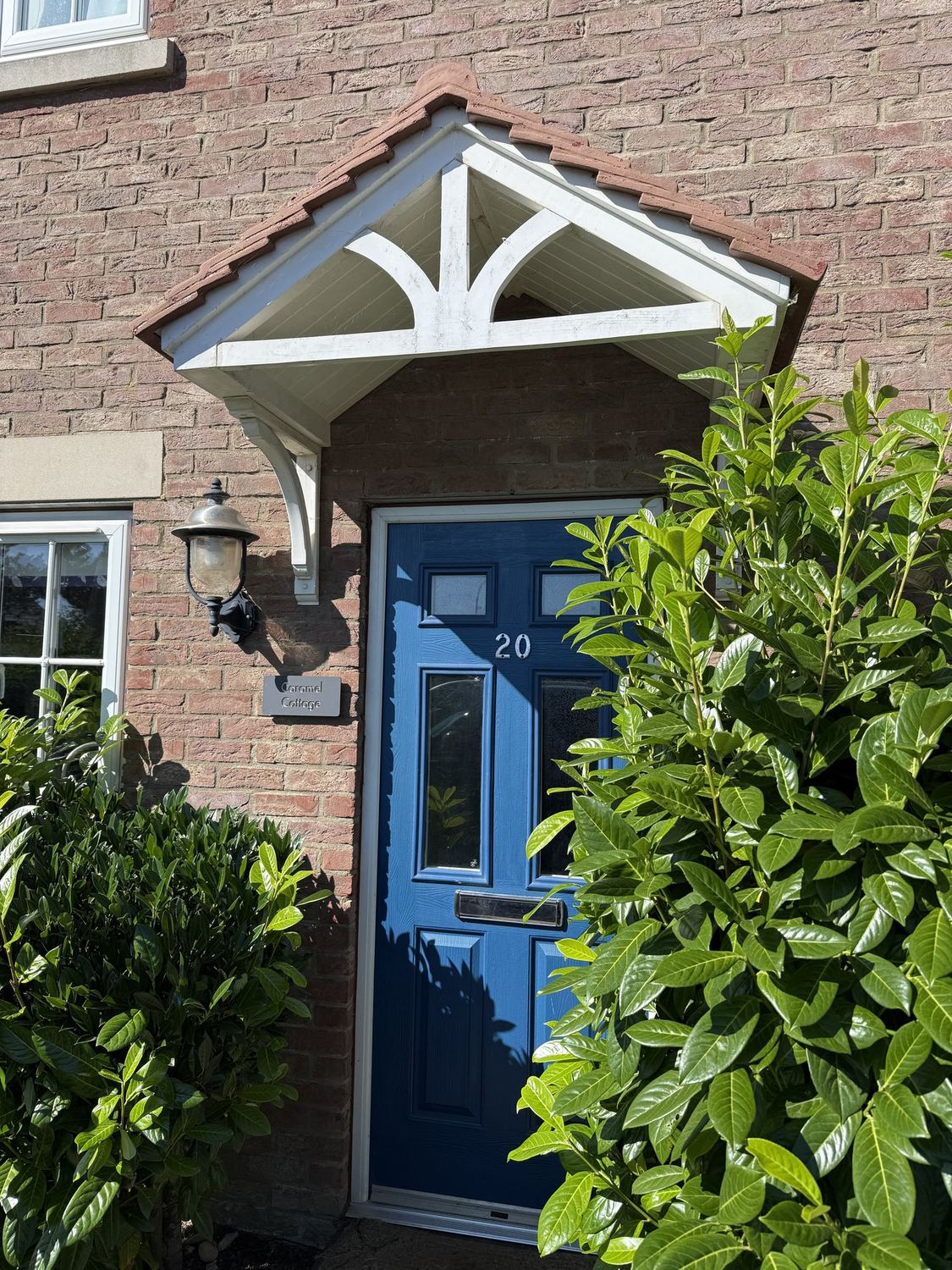 Caramel Cottage front door, The Bay Filey - Caramel Cottage The blue front door and name sign of Caramel Cottage at The Bay, Filey