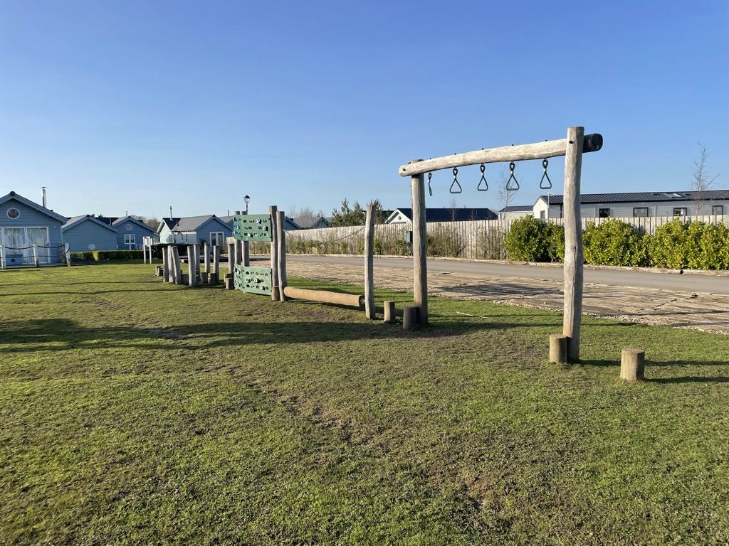 The children's playground and swings on the green at The Bay, Filey