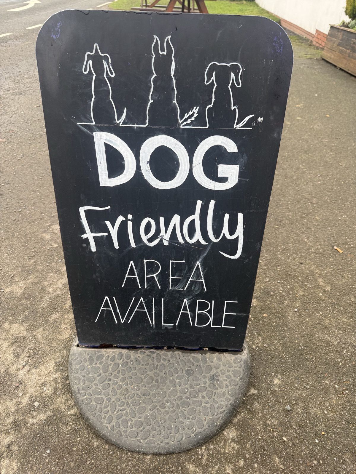 A Dog Friendly Area Available board outside a pub near Hunmanby