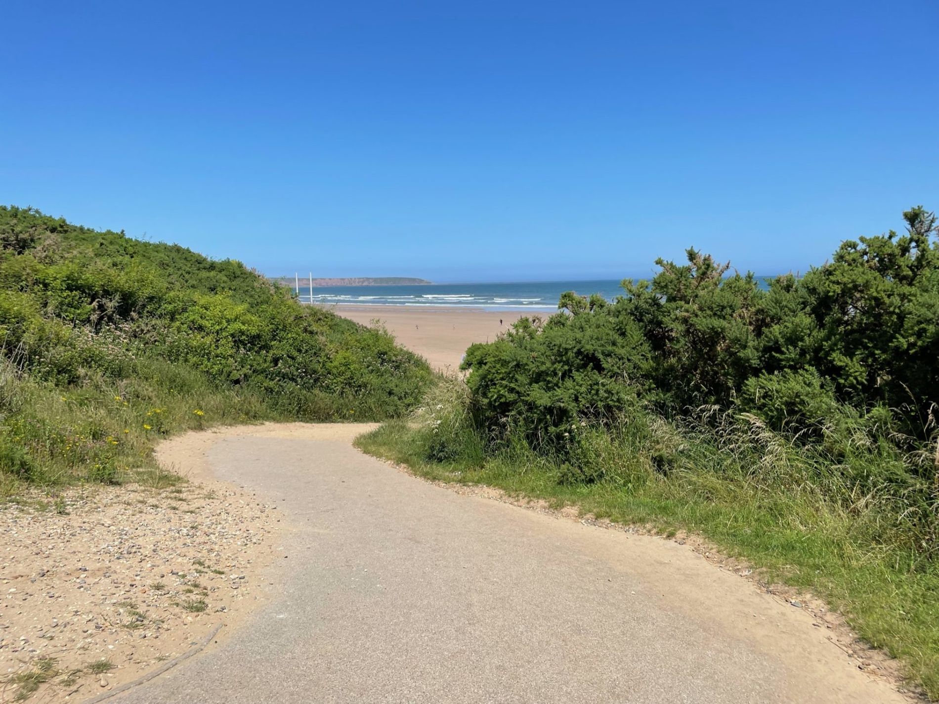 The surfaced path curving down through the dunes to Hunmanby Gap beach