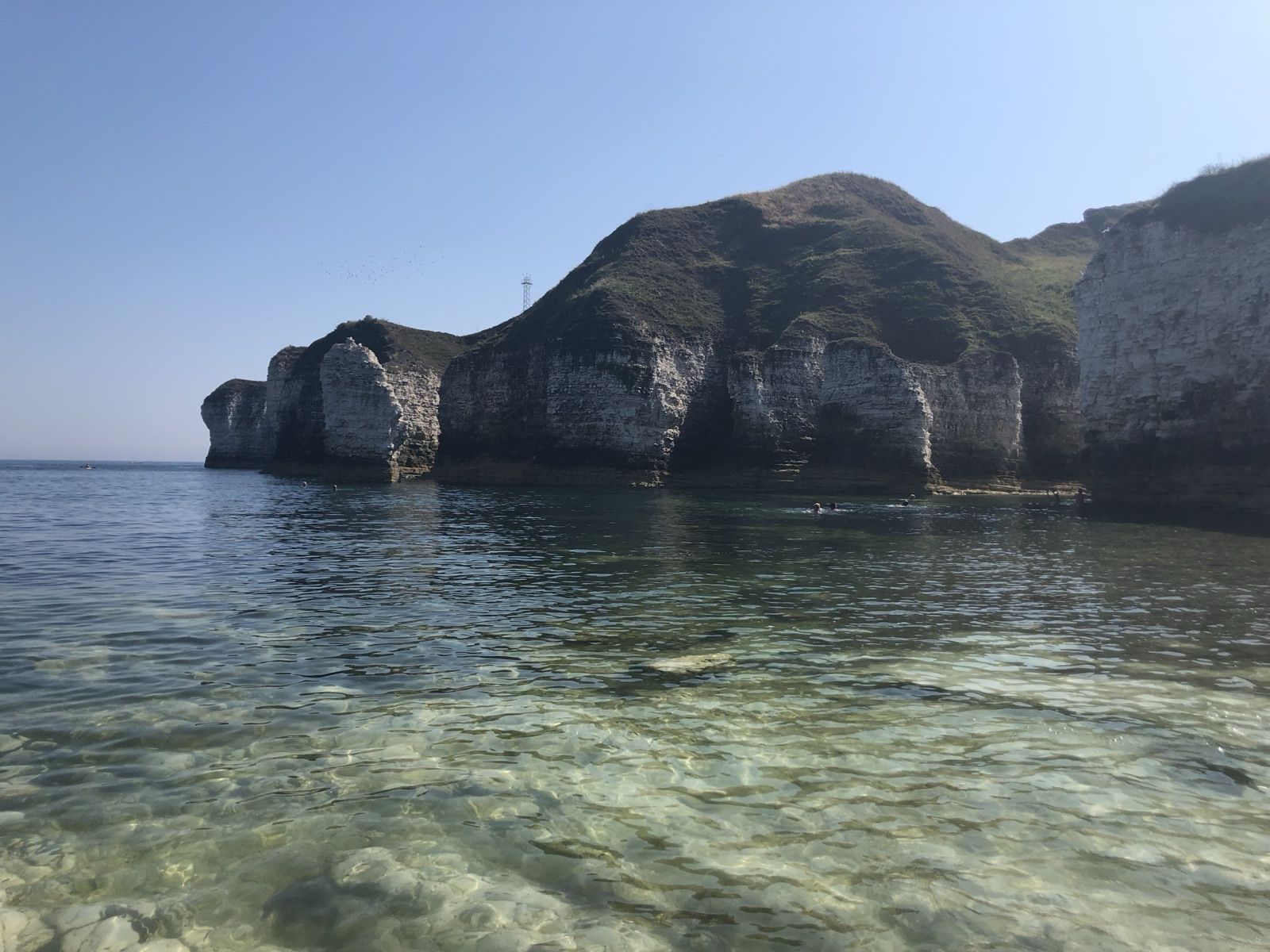 Clear green water below the chalk stacks at North Landing, Flamborough