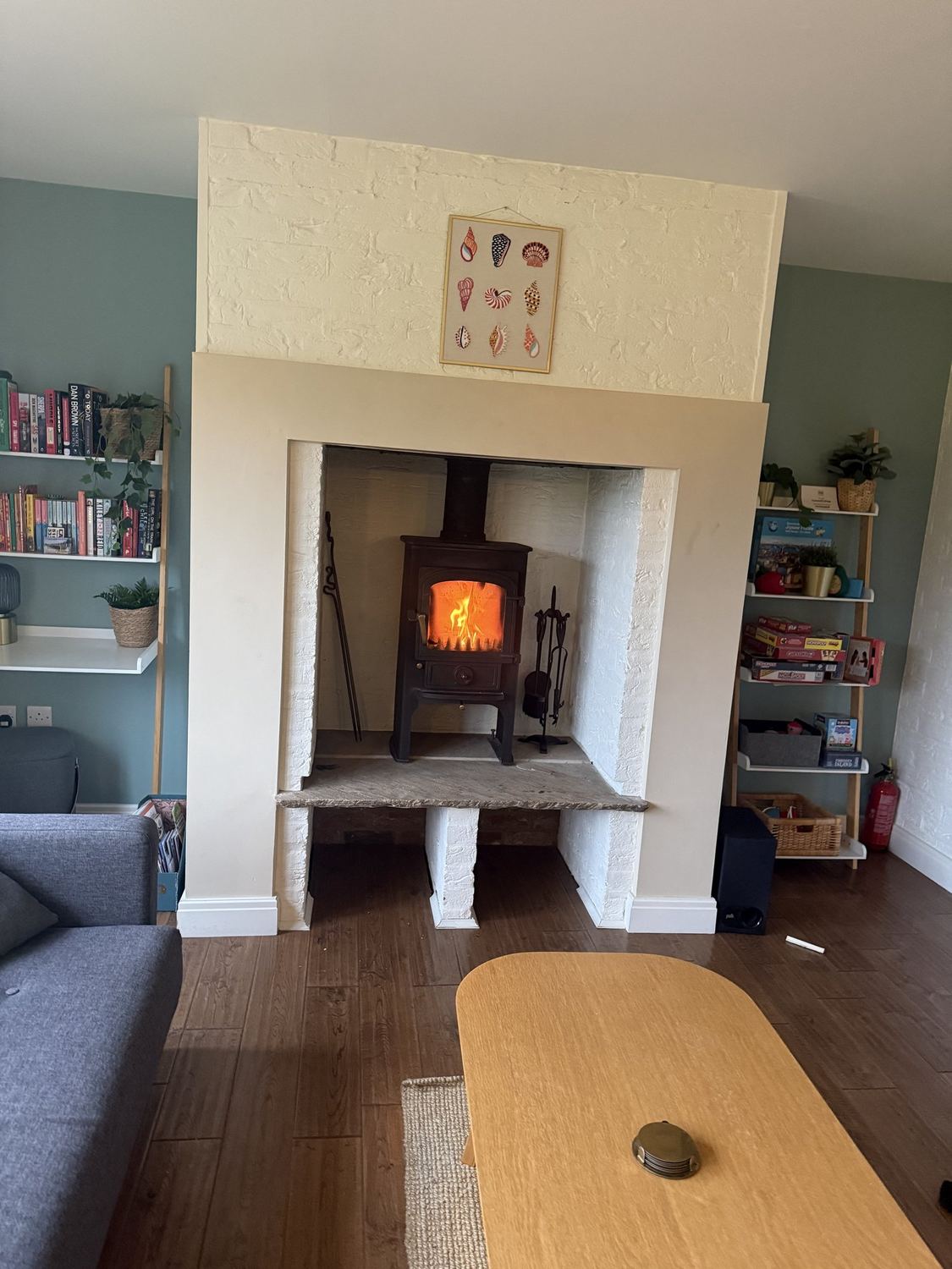 Log burner lit in the separate living room - Caramel Cottage The log burner lit in the separate living room at Caramel Cottage
