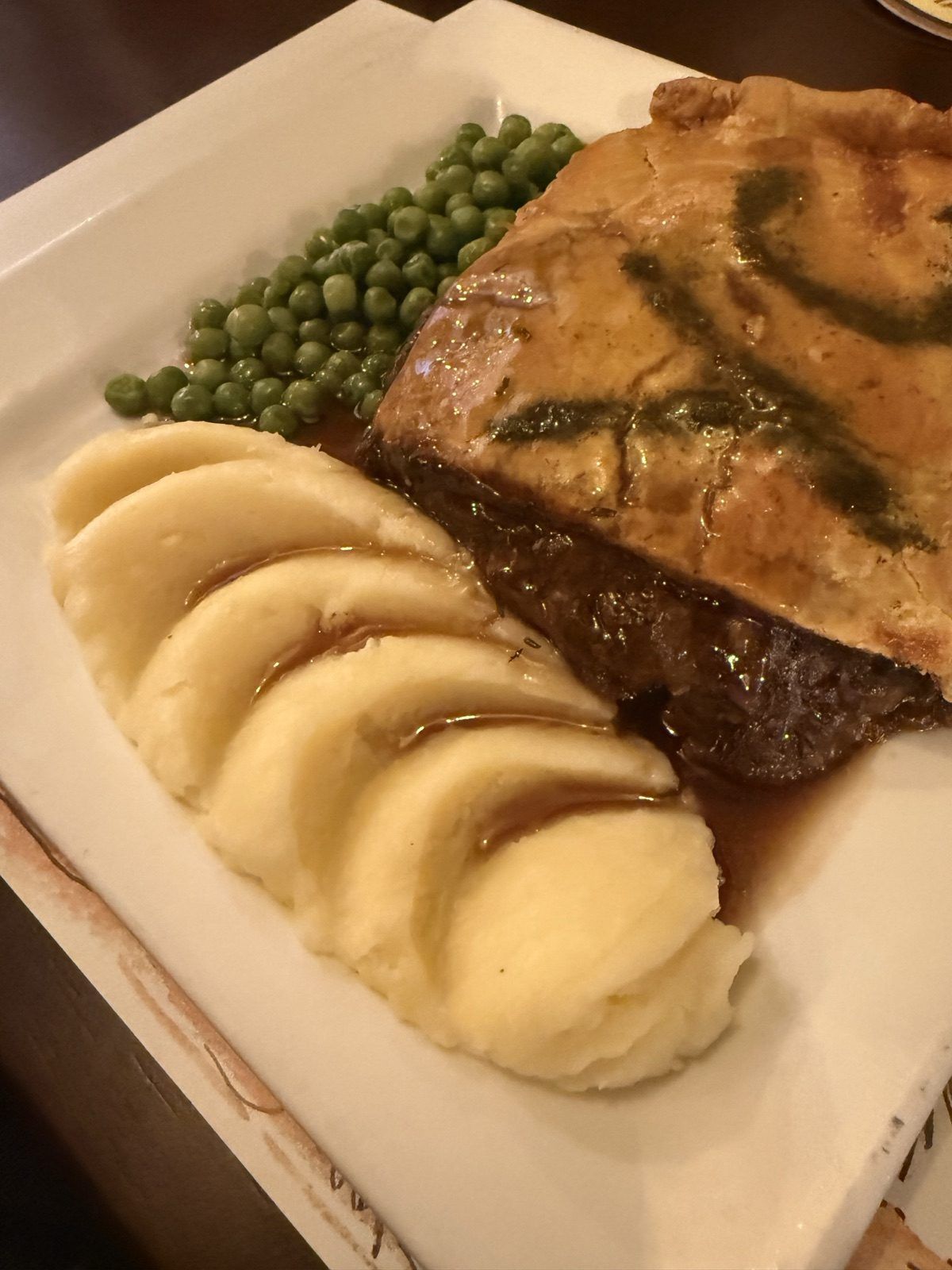 A pie with mashed potato and peas served at a pub in Hunmanby